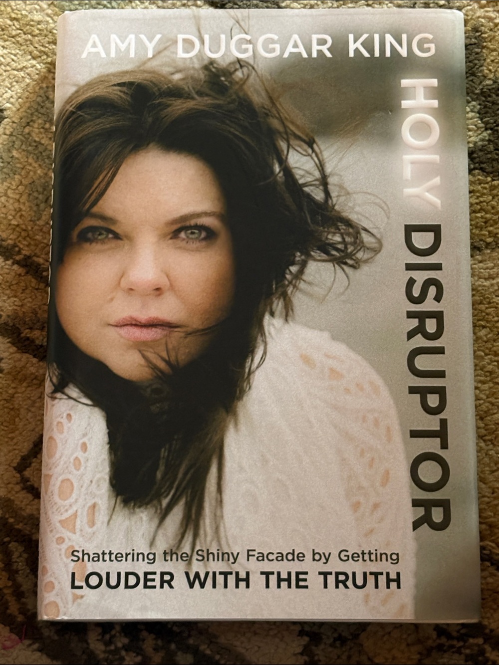 Hardcover book  Holy Disruptor. Amy Duggar King